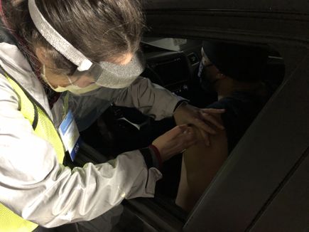 Drive-through COVID-19 vaccine clinics