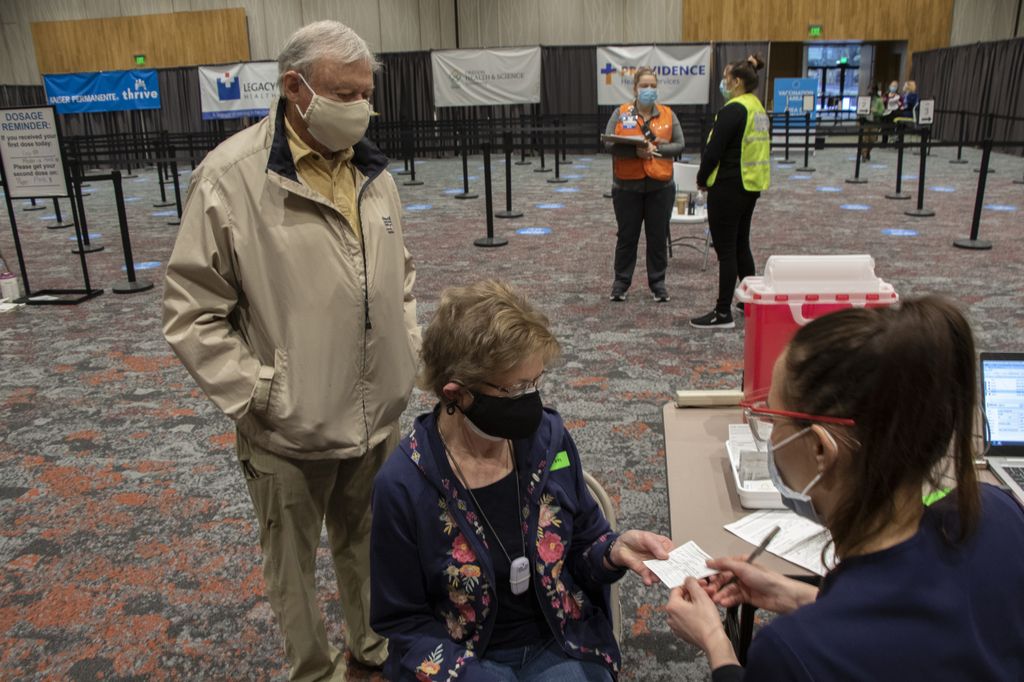 Seniors receive COVID vaccinations