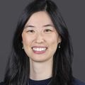 Elizabeth Yiu, M.S.M., FNP-C (OHSU) A person with long black hair, smiling.