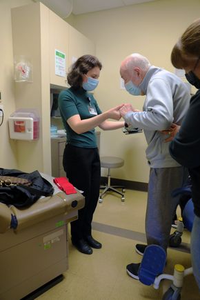 Marian Dale, M.D., M.C.R. with patient