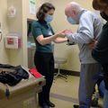 Marian Dale, M.D., M.C.R. with patient