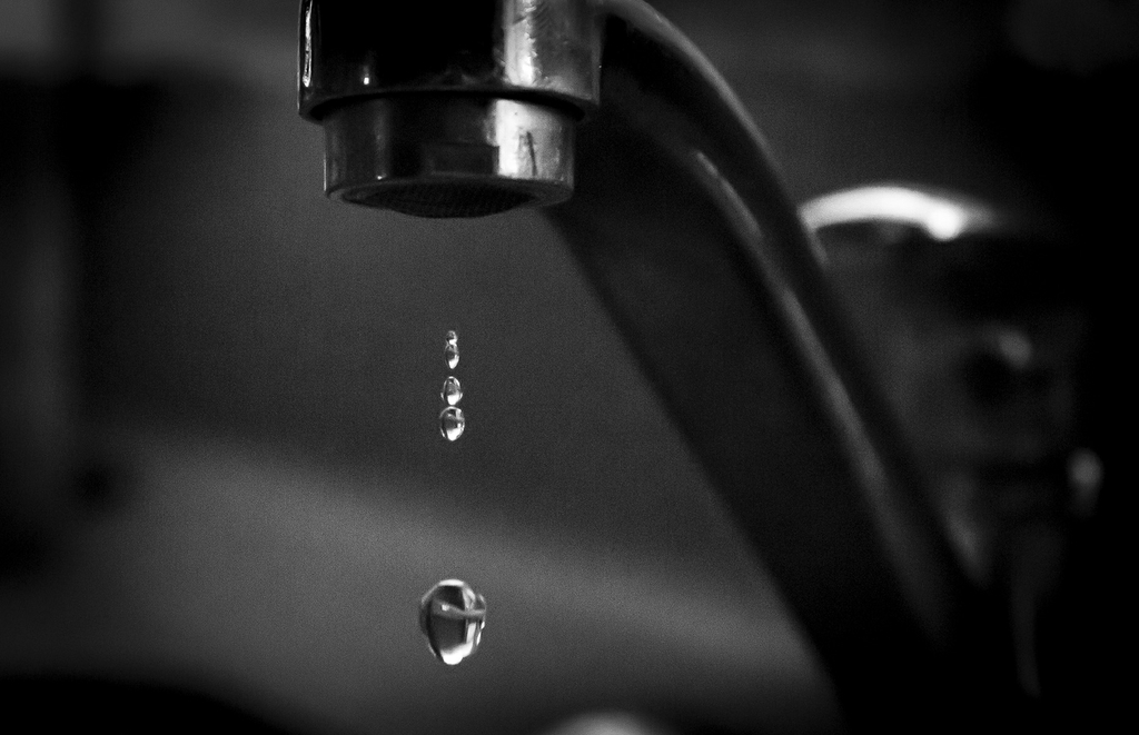 Water drips from a faucet. A study finds oral fluoride supplements might not be used consistently or at all in an alternative move away from water fluoridation. (Getty Images)