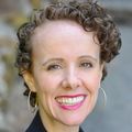 Andrea "Anne" Smeraglio, M.D. (OHSU) has short curly hair, smiling.