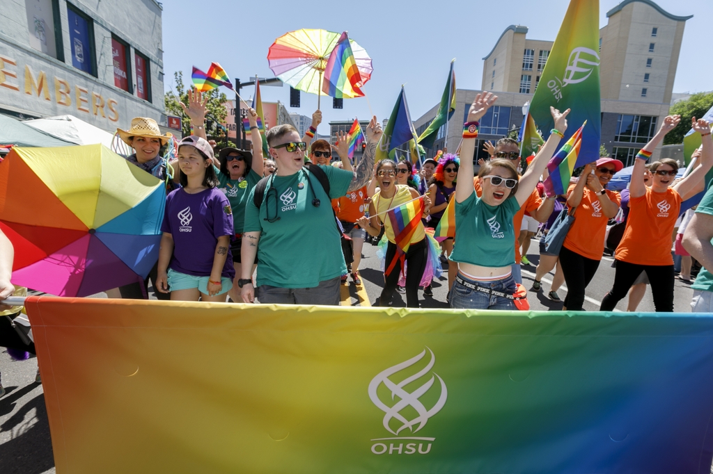 OHSU employees march in a Pride Parade. This Pride Month, the Human Rights Commission named OHSU a 2024 LGBTQ+ Healthcare Equality Leader for the tenth time. (OHSU)