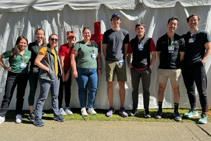 Oregon Health and Science University - AAFP 2024: Group of nine people smiling.