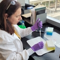 Cristiane Miranda Franca, D.D.S., Ph.D., in lab
