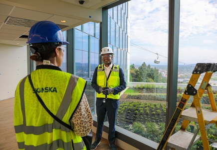 President Shereef Elnahal, M.D., walks through the new inpatient building
