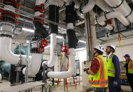 President Shereef Elnahal, M.D., walks through the new inpatient building