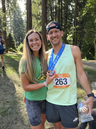OHSU patient Matt Hazard with his wife, Amanda, left, after running the Get Your Rear In Gear 5K race in 2024. (Courtesy)