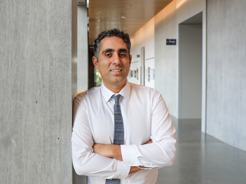 For radiation oncologist Nima Nabavizadeh, M.D., watching his patients with early stage cancer be cured has become a welcome and regular occurrence. (OHSU/Christine Torres Hicks)