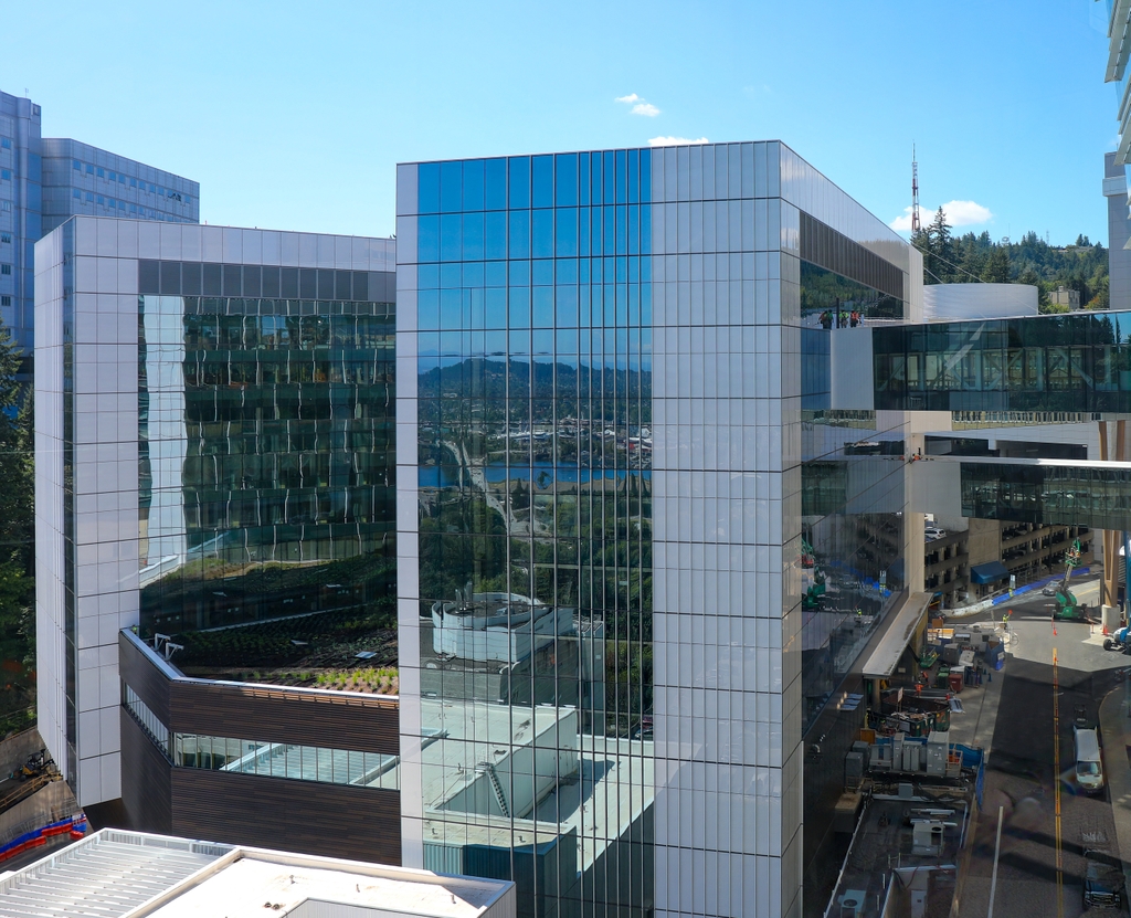 OHSU's New Vista Pavilion stands 14 stories tall and is connected to the hospital via skybridges.