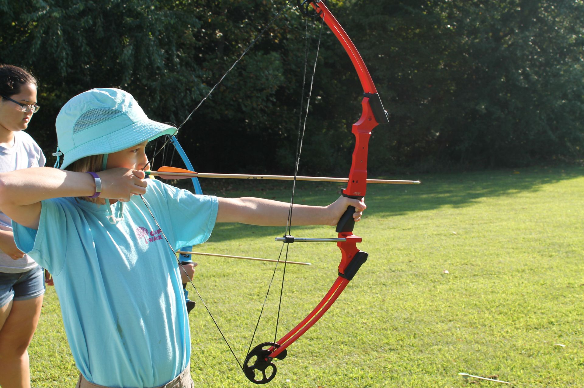 Students learning new skills at Hunting and Fishing Day