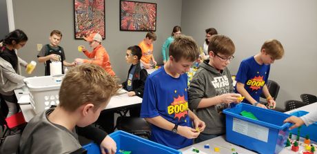 YouthLink students create LEGO ornaments for their LEGO tree at the World of Energy’s Festival of Trees. WOE4