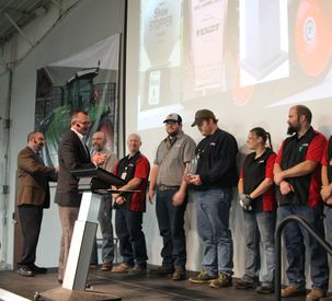 Bob Crain Presents Assembly Plant of Year Award to AGCO Jackson Operations