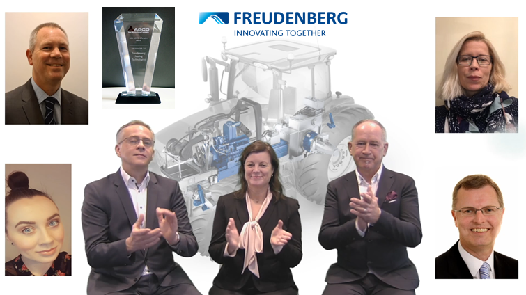 Collage of smiling headshots surrounding illustrated tractor backdrop and three people in suits clapping mirthfully; award superimposed