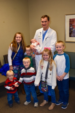 Dr. Gregory Reynolds with the Smith children.