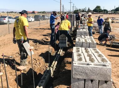 Volunteers Help Build Homes for Low-Income Veterans