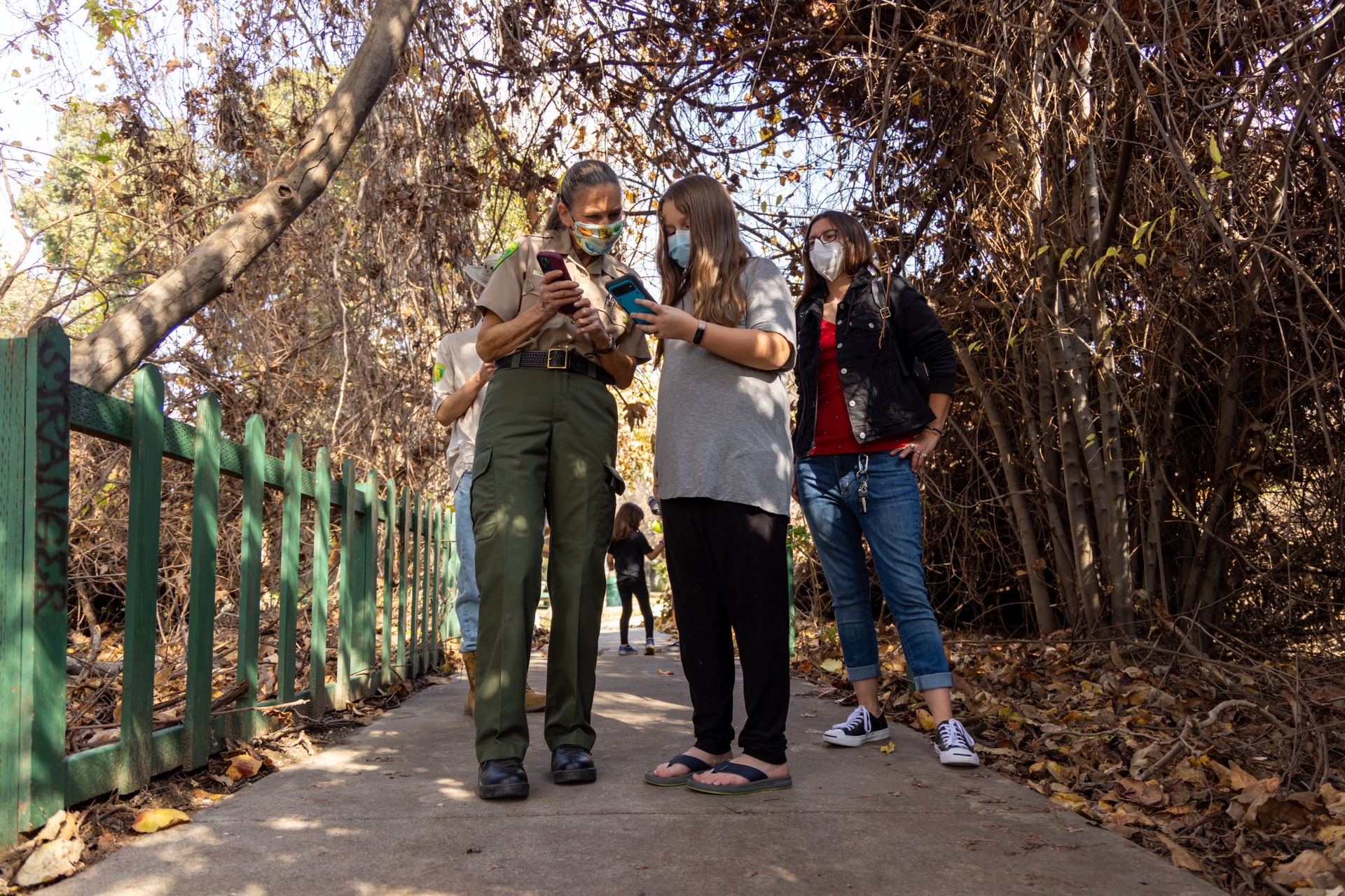 Angela Guiney looks on as her 10-year-old daughter, Jacklynn, begins her Smokey Bear wildfire prevention mission.