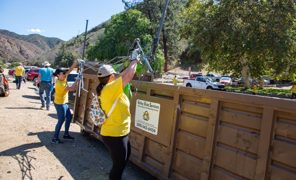 Volunteers cleaned up debris, including canopy frames, coolers and even a motorized raft.