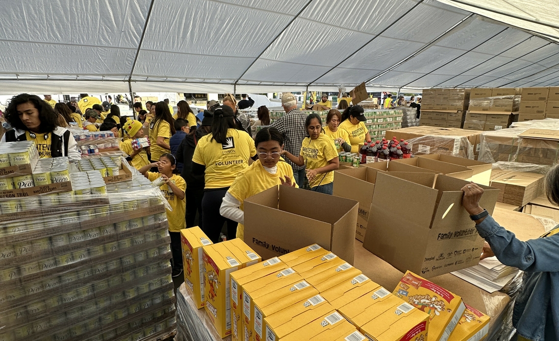 Hundreds of SCE employees and their families help pack nearly 5,000 food boxes at the 18th Annual National Family Volunteer Day.