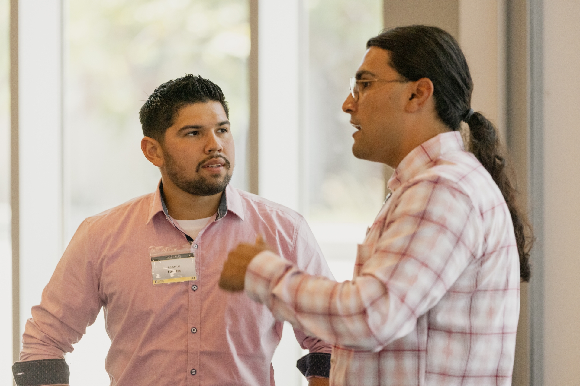 2023 Edison International Lineworker Scholarship winner and Marine Corps veteran Lazarus Fuentes (left) with fellow winner Ubaldo Ryes Tapia.