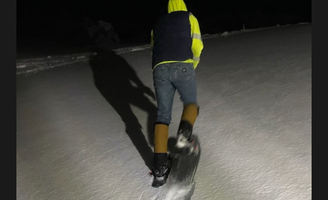 SCE troubleman Cody Schmidt uses snowshoes while responding to a call during the 2023 winter storms.