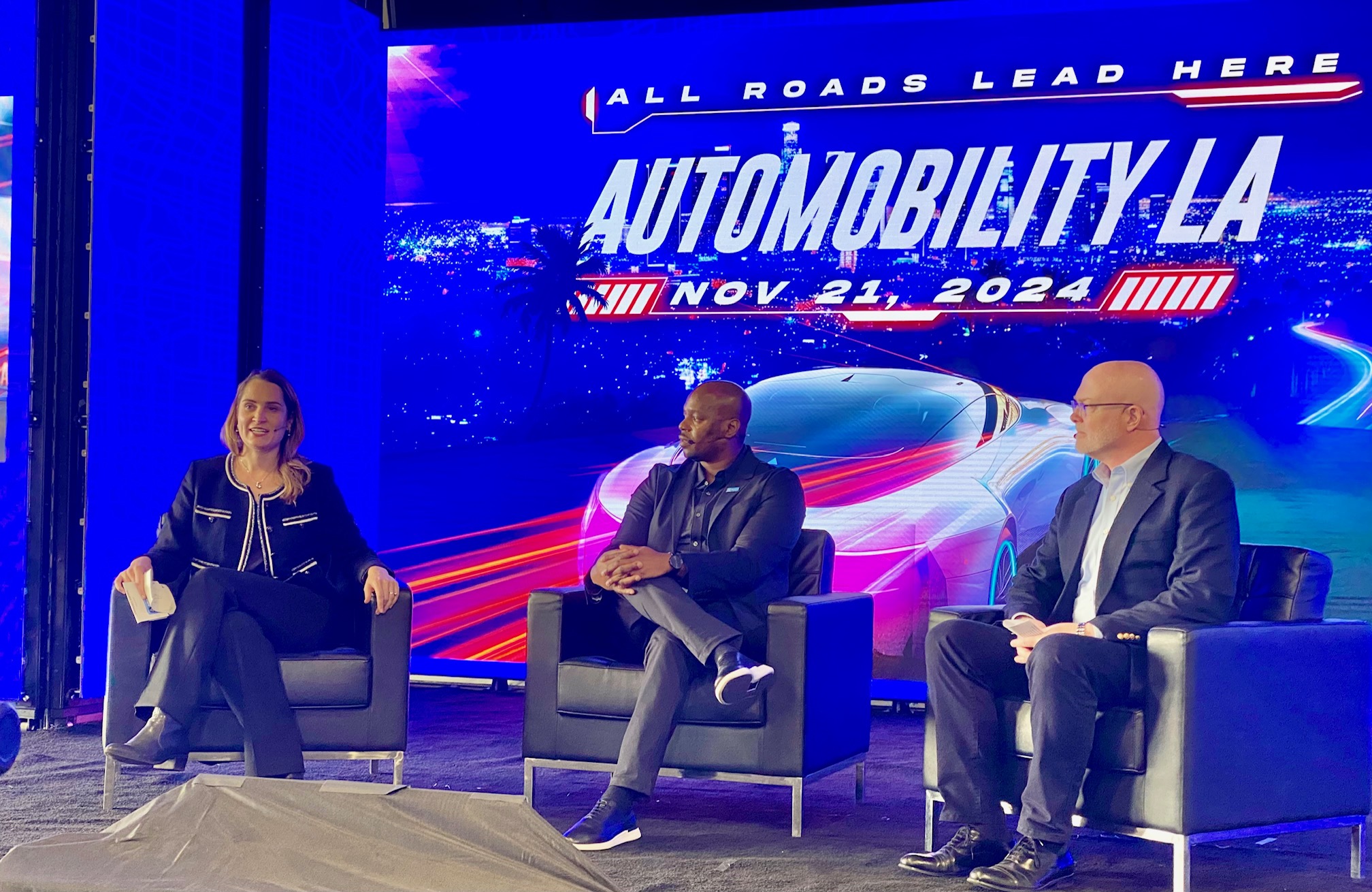 (l-r) Cara Merriman, vice president of Corporate Development at Inspiration Mobility, Cody Collins, regional director at General Motors Envolve and Todd Carlson, SCE principal manager of Transportation Services, talk about the use of the Silverado in SCE’s electrified fleet.