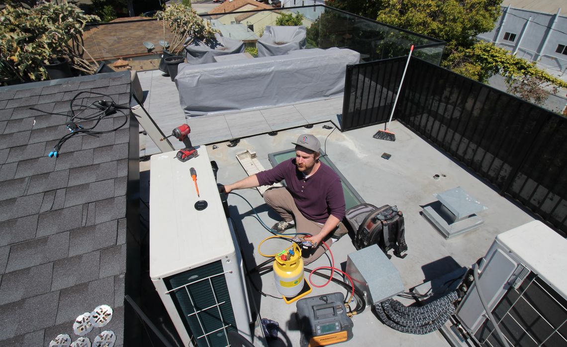 Austin Landi installs a Fujitsu ducted mini-split heat pump system for a customer in Culver City, California.
