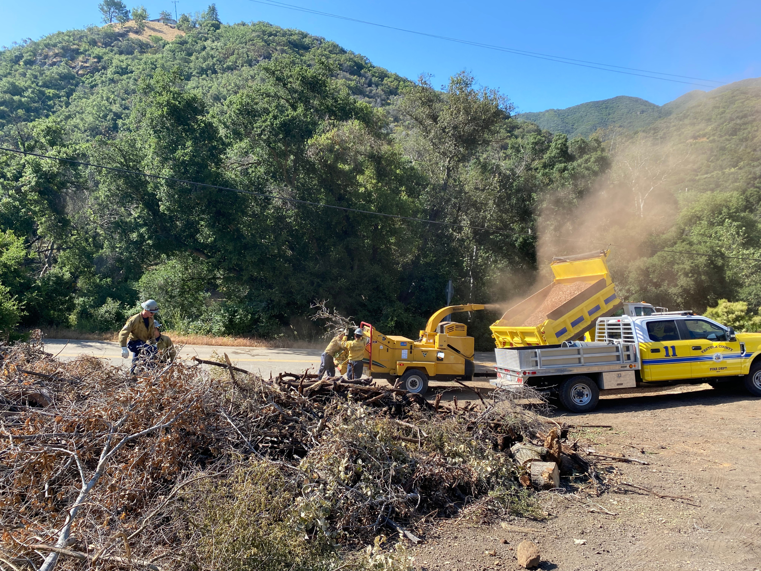 Miles of overgrown wildlands along the Venutra River makes surrounding homes susceptible to the dangers of wildfire season.
