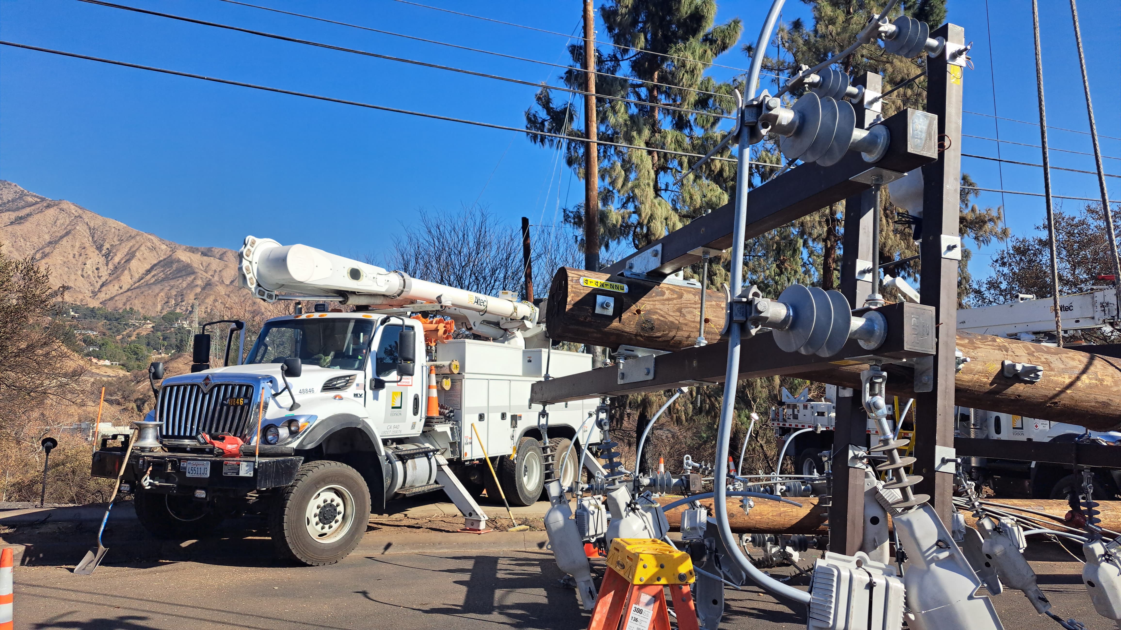 SCE crews safely working to quickly to repair damaged equipment and restore power in the Eaton area.