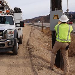 Crews rely on calls with system operators to help them safely turn power on and off from the field.