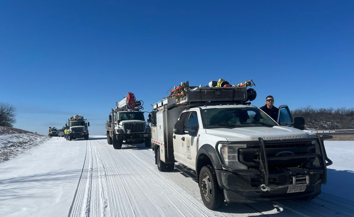 Fresh snowfall covers the road, a preview of the icy conditions SCE crews will face as they near the storm zone.