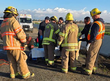 Lineworkers Help Save Driver of Submerged Car