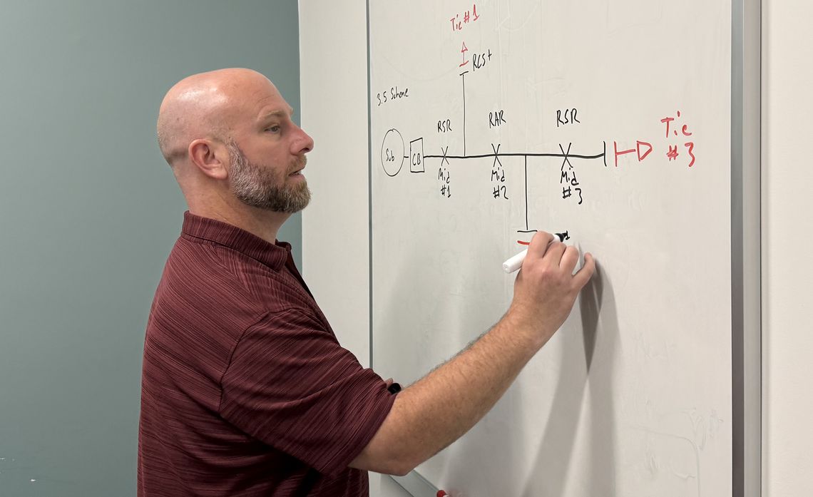Much of Burl Smith’s work as an SCE senior engineer happens behind the scenes, designing the systems that help keep power flowing reliably.