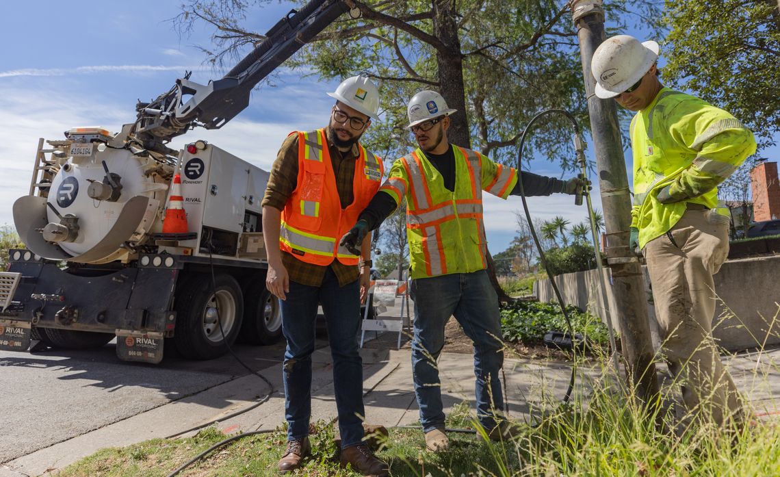 Using pressurized water and a powerful vacuum system, undergrounding crews gently clear soil while preserving tree root systems.