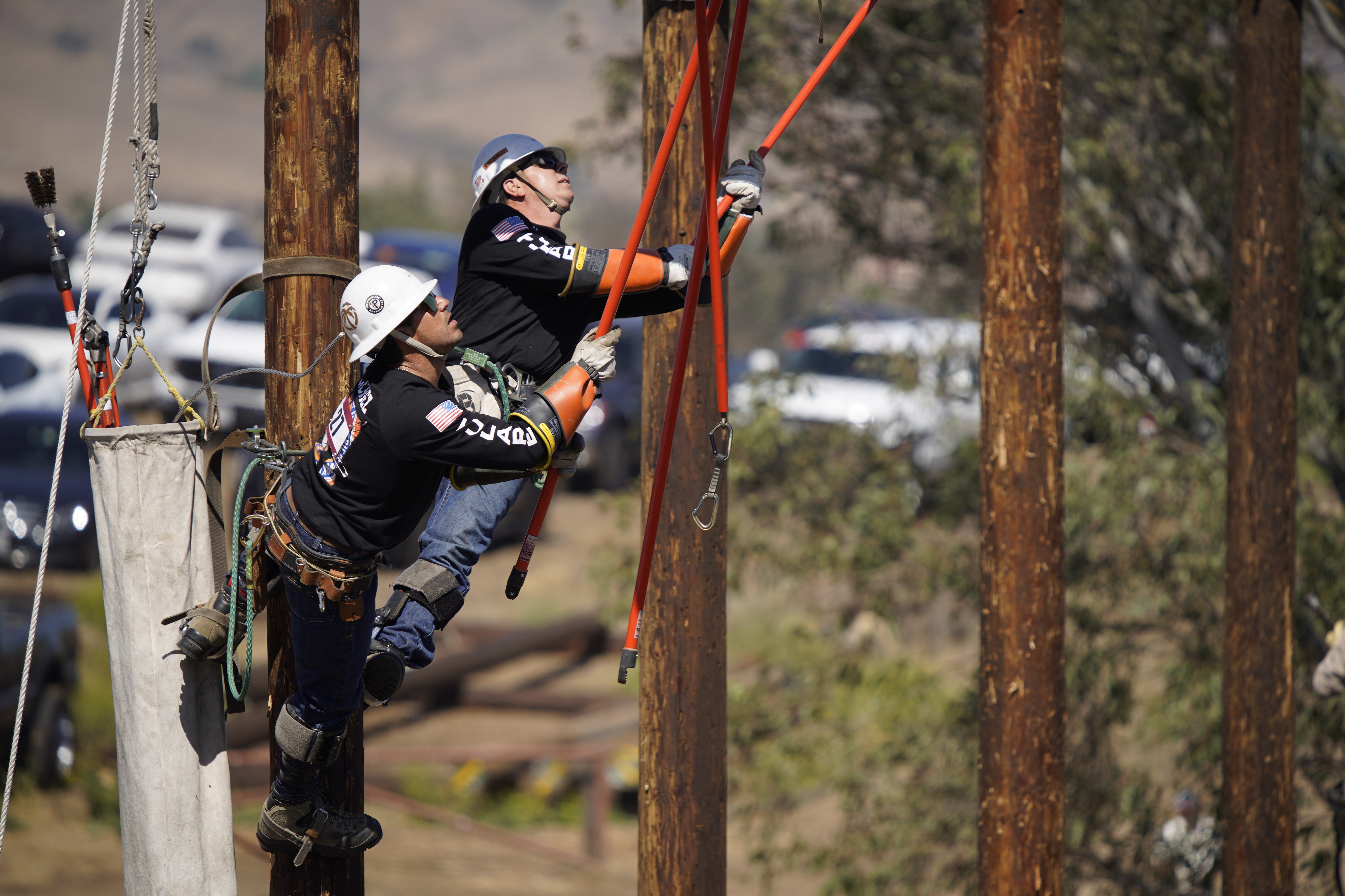Vincent Sanchez and Justin Maple compete in the tap change out event at the SCE's Lineman's Rodeo.