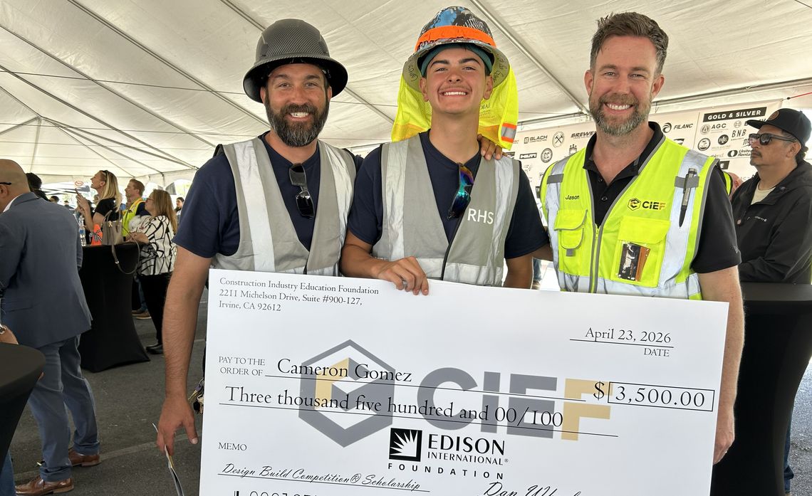 Cameron Gomez, joined by his construction teacher Paul Eisenzimmer (l) and CIEF’s events and youth programs manager Jason Manion (r), accepts a scholarship sponsored by Edison International Foundation that will help him take the next step toward the trades.