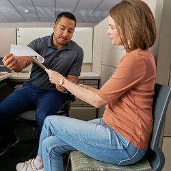SCE Customer Service Representative Daniel Cortez (left) works directly with customers who are rebuilding and recovering after the Eaton Fire.