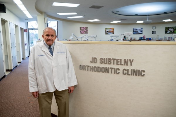 Dr. Sommers standing in front of ortho clinic