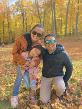 Dr. Huang, her husband and daughter on a beautiful fall day.