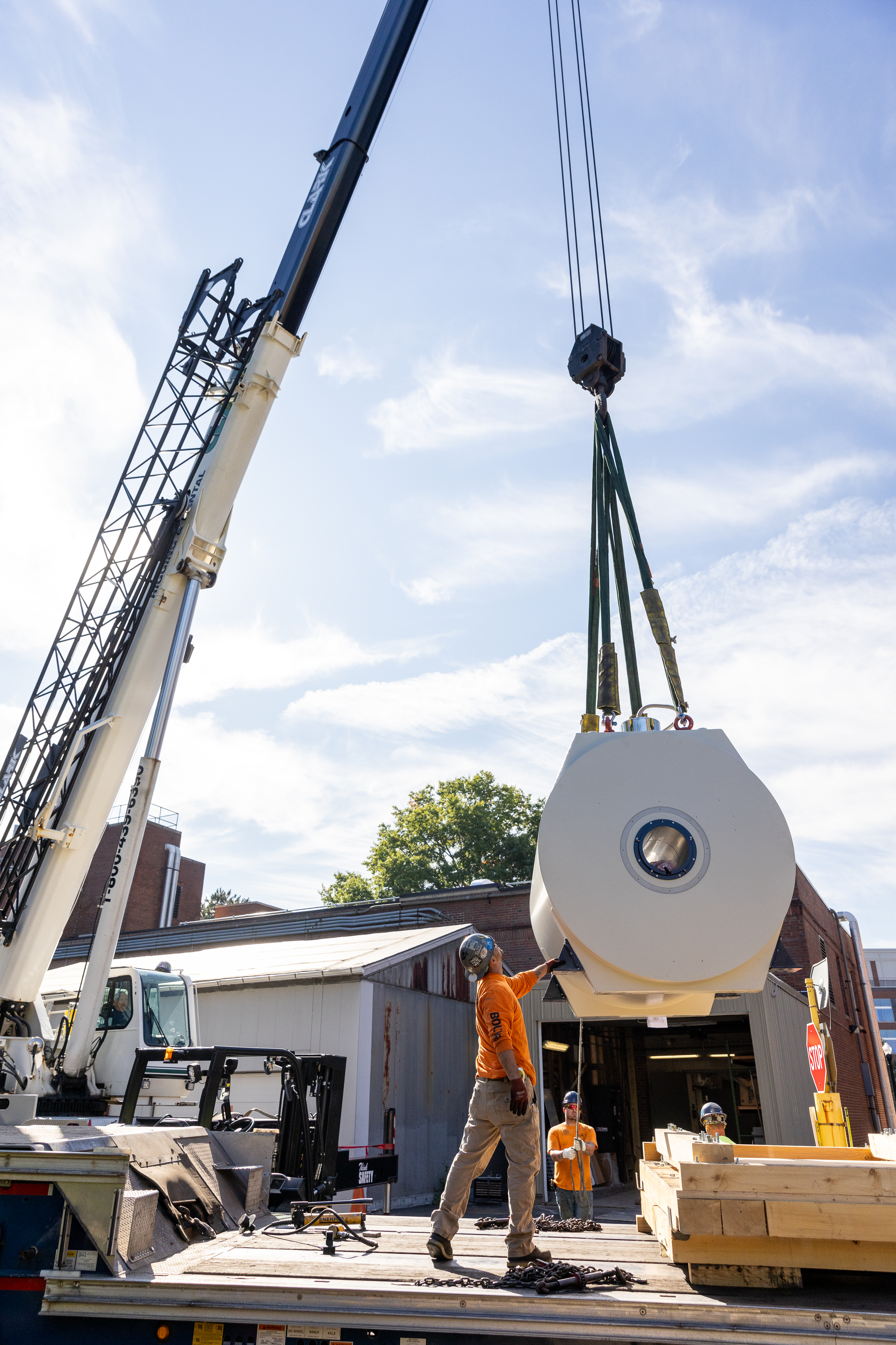 Delivery day: 9.4T MRI is lifted by crane as it begins its journey into CABIN.