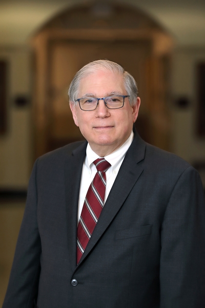 A portrait of Dr. Lawrence Tabak