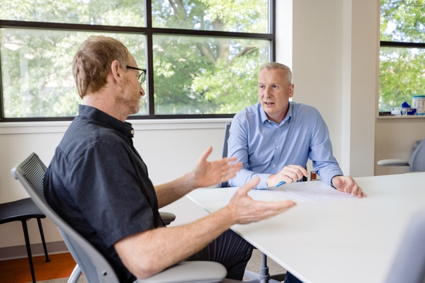 Edward Freedman, PhD, (left) sits with John Foxe, PhD, in lab at the University of Rochester.