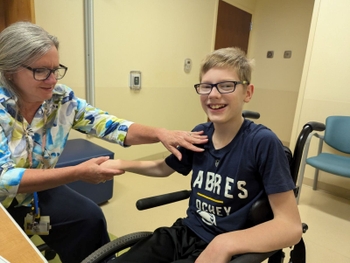 Boy with Glasses with Cerebral Palsy