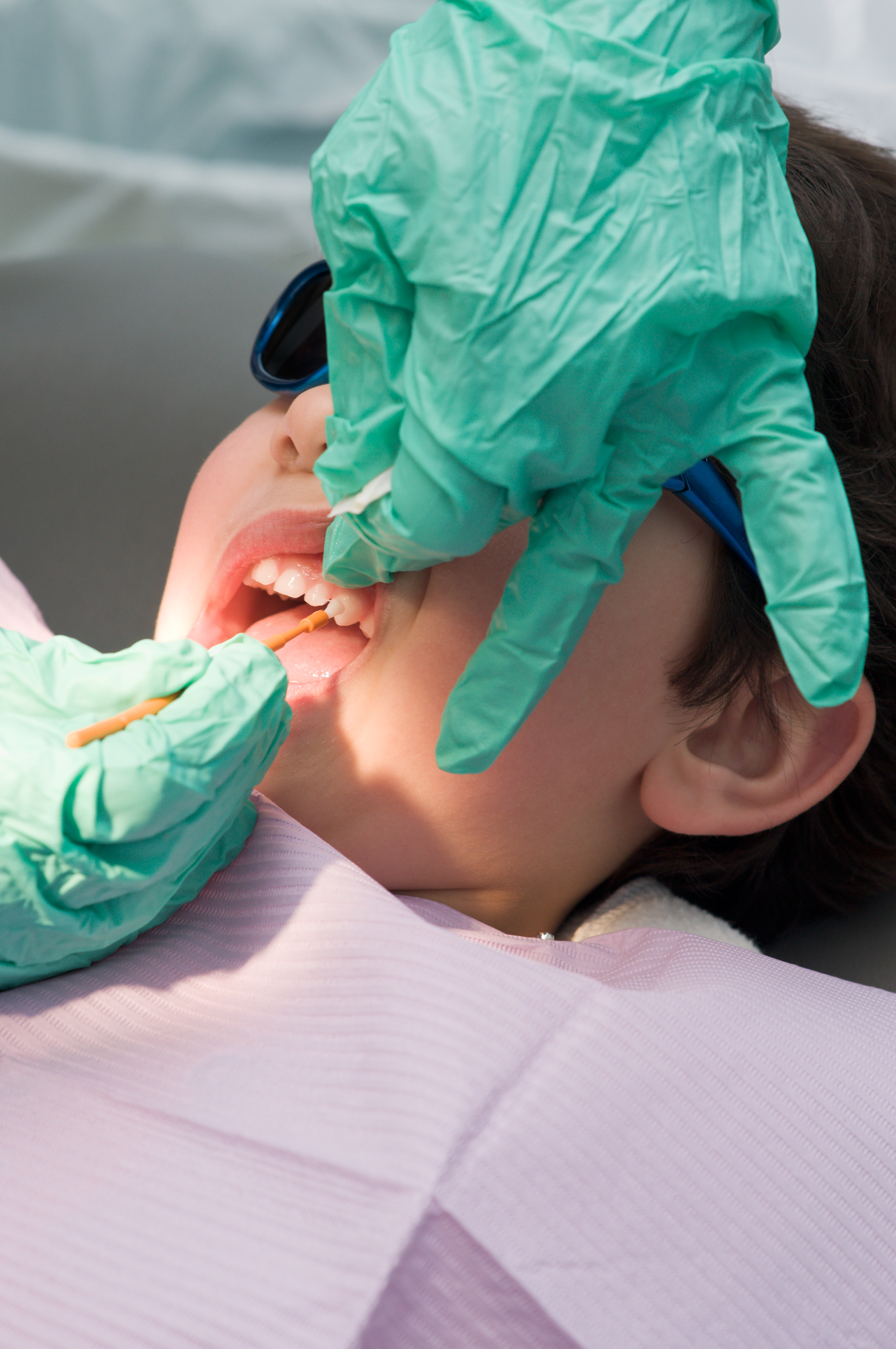 Person at the dentist getting an exam