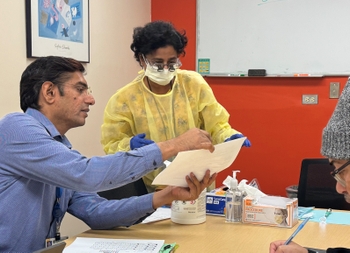 Dr. Gajendra instructs a resident
