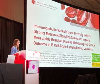 Female physician at a podium at the American Society of Hematology annual meeting