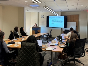 a guest speaker gives a presentation as part of the HRSA-EIOH EPIC Dental Faculty Development Program.