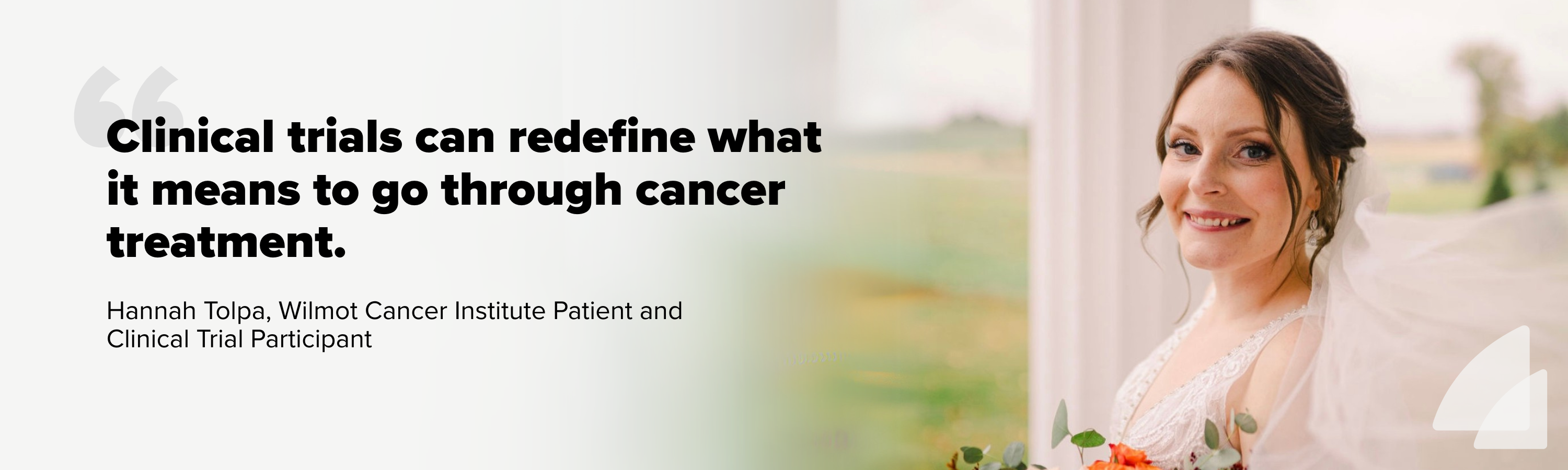 Women in wedding gown smiles