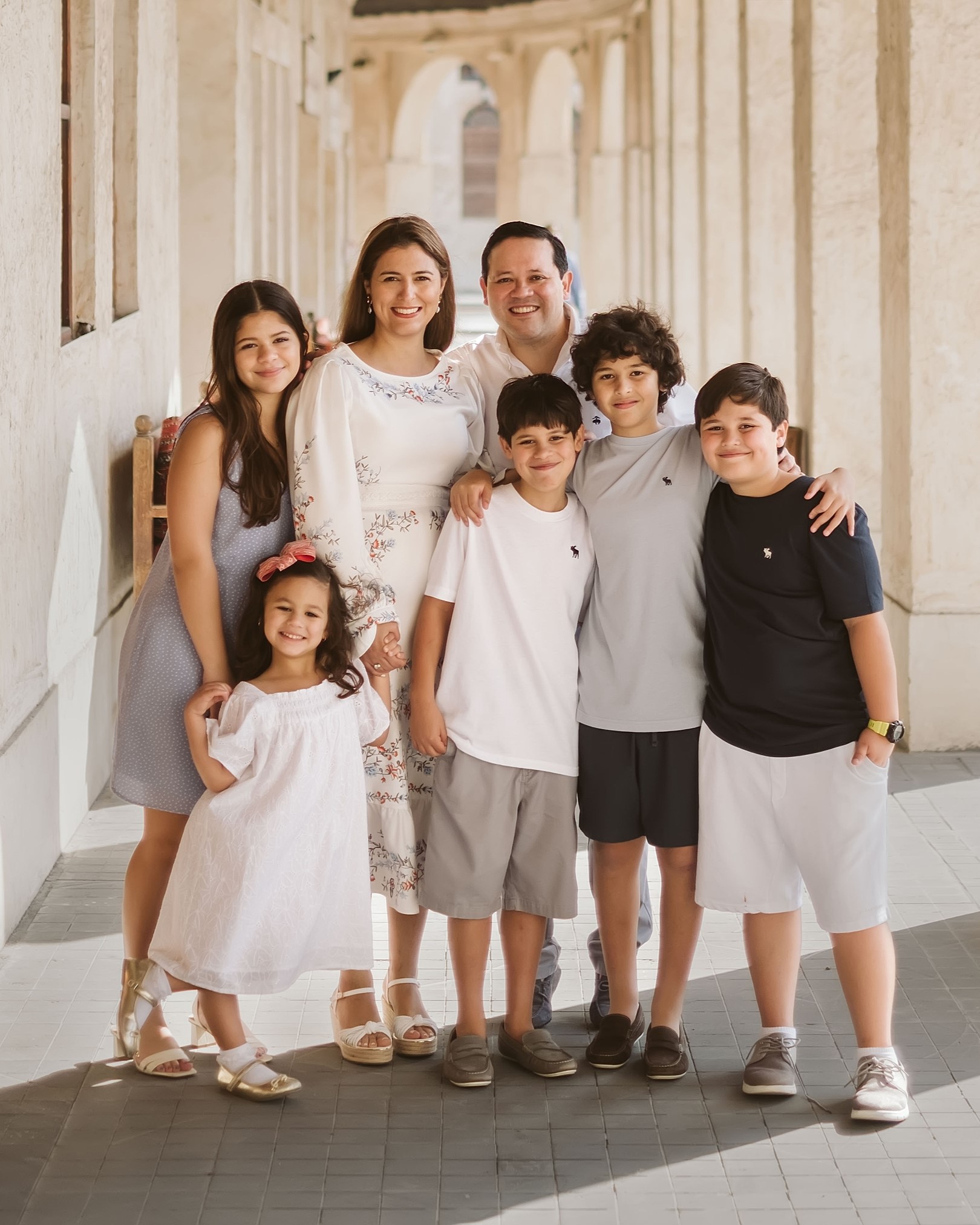 Dr. Martinez poses with his wife and 5 children.